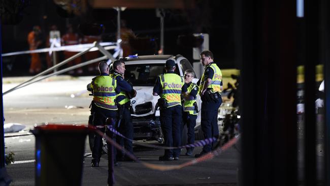 Police comb the area as they begin to piece together how the crash took place. Picture: NCA NewsWire / Josie Hayden