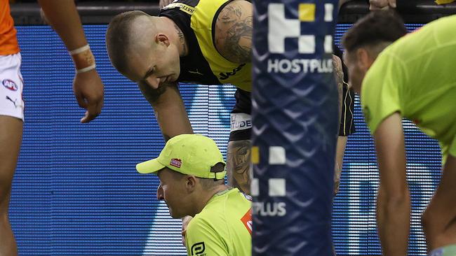 AFL Round 9. 15/05/2021 .  Richmond vs GWS Giants at Marvel Stadium, Melbourne.  Richmonds Dustin Martin  cleans up the goal umpire after soccering a last qtr goal  .  Pic: Michael Klein