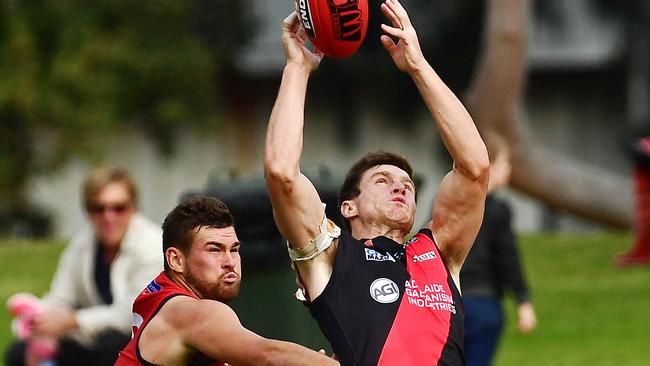 West's Jono Beech takes a strong mark in front of Norwood's Mitch Grigg. Picture: Tom Huntley