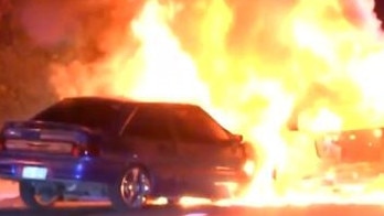 Police were called to reports two cars were on fire about 6am on Coolmunda Street at Marsden. Picture: 7News