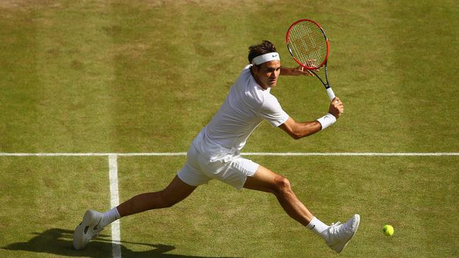 Roger Federer plays a backhand in the Gentlemens Singles Semi Final match against Andy Murray at Wimbledon, 2015. Picture: Clive Brunskill/Getty Images