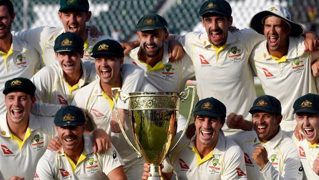 The Australians celebrate claiming the Benaud-Qadir Trophy. Picture. Aamir Qureshi/AFP