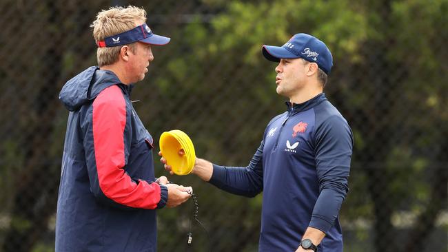 Roosters head coach Trent Robinson speaks to Cooper Cronk during a Sydney Roosters NRL training session at Robertson Road Synthetic Field on March 07, 2022 in Sydney, Australia. (Photo by Mark Kolbe/Getty Images)