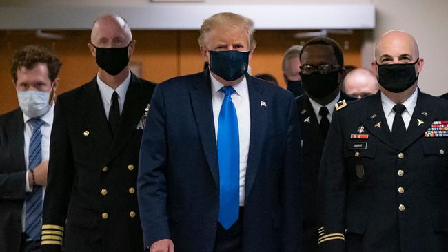 US President Donald Trump wears a mask as he visits Walter Reed National Military Medical Centre in Bethesda, Maryland on July 11.