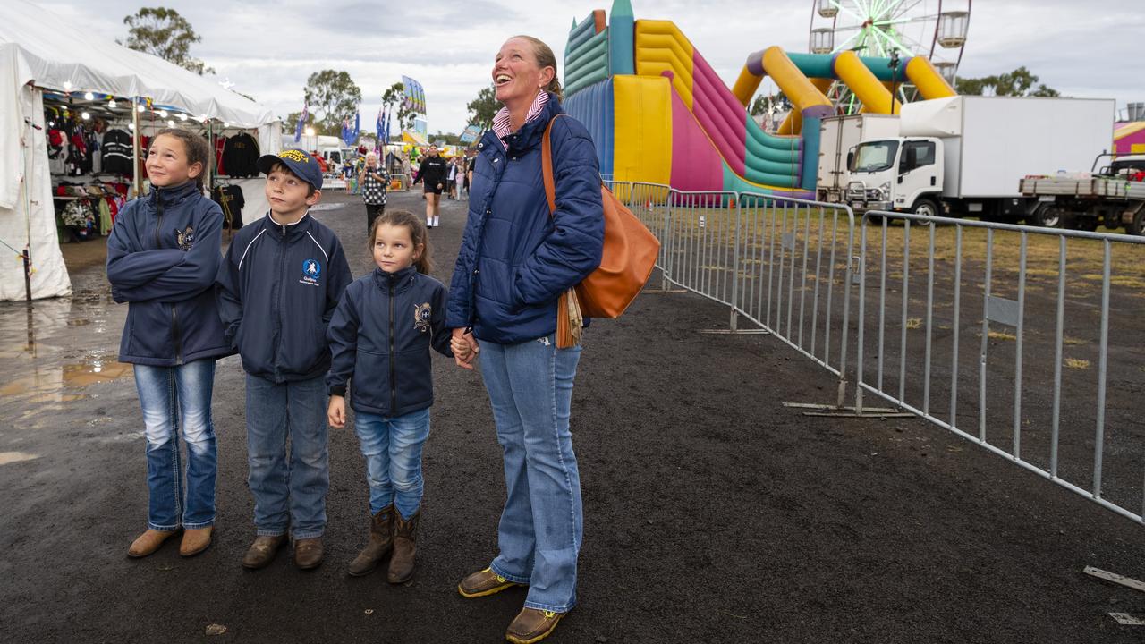 Watching a ride are (from left) Latoya, Jack, Zoe and Jade Challenor at the 2022 Toowoomba Royal Show, Saturday, March 26, 2022. Picture: Kevin Farmer