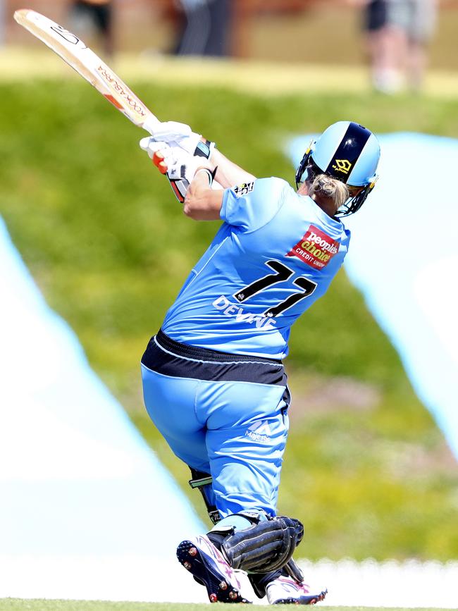 One of five: Sophie Devine belts one of her five consecutive sixes against Melbourne Stars at Karen Rolton Oval. Picture: SARAH REED