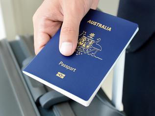 Hands giving passport (of Australia)