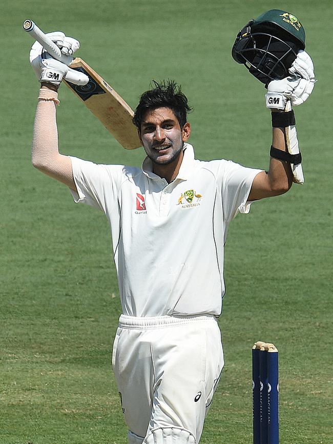 Jason Sangha scores a century against England.