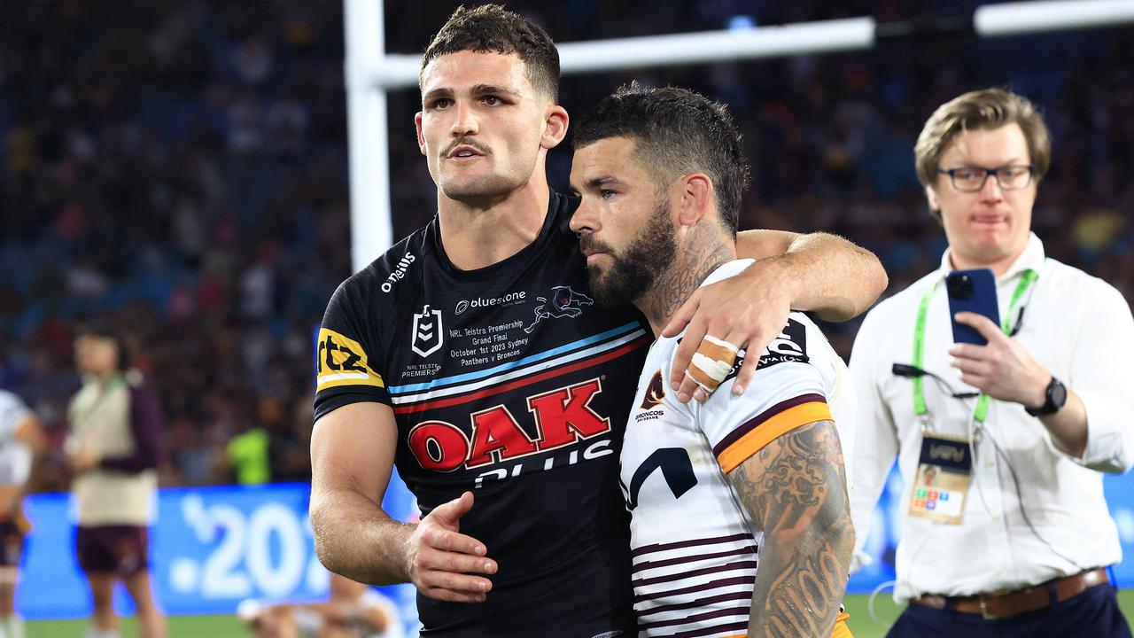 Nathan Cleary and Adam Reynolds share a moment after the siren. Pics Adam Head