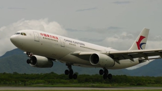 A China Eastern Airlines flight MU571 lands at Cairns Airport.