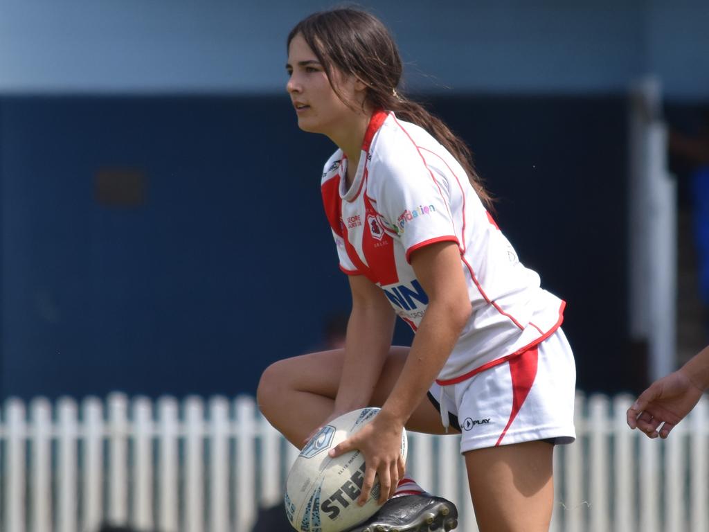 Emma Warr takes a tap during a trial against the Roosters. Picture: Sean Teuma