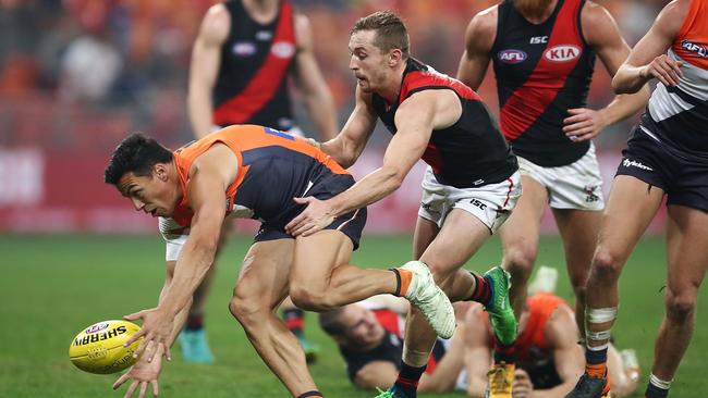 Devon Smith isn’t letting former GWS teammate Dylan Shiel get away. Pic: Getty Images