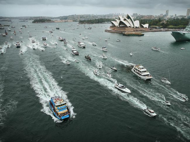 Ferries racing during the annual Sydney Ferry Race on Sydney Harbour on Australia Day 2017. Picture: Richard Dobson