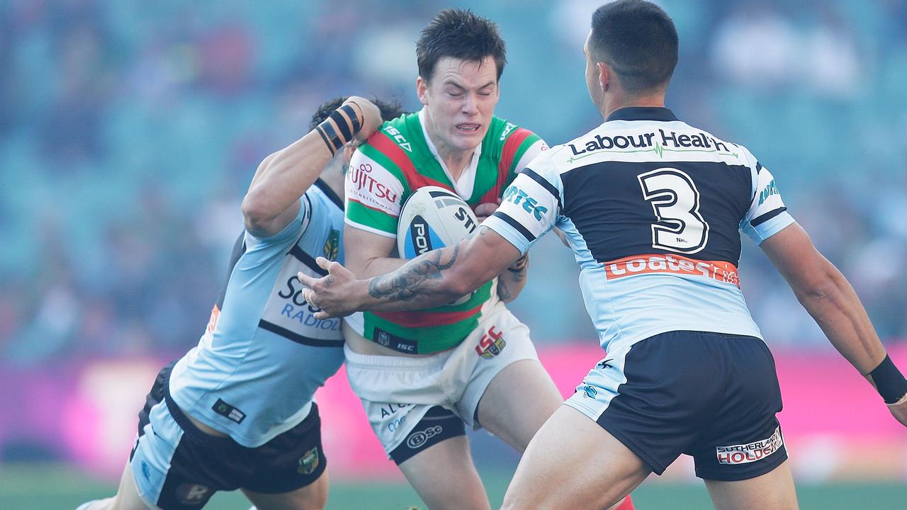 SYDNEY, AUSTRALIA - SEPTEMBER 13: Luke Keary of the Rabbitohs is tackled by Gerard Beale of the Sharks during the NRL Elimination Final match between the Cronulla Sharks and the South Sydney Rabbitohs at Allianz Stadium on September 13, 2015 in Sydney, Australia. (Photo by Mark Metcalfe/Getty Images)