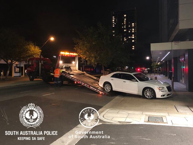 A man and a woman have been arrested after a high-speed chase up the SE Freeway and back into the city. It ended in front of police HQ. Picture: SAPOL