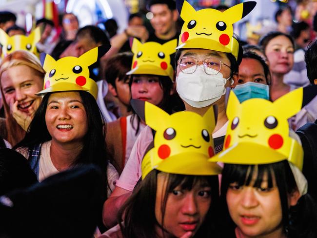 Central World Shopping Center in Bangkok transforms into a Pokemon haven as fans don Pikachu hats during the ‘Light Up Christmas Tree Celebration’. Picture: Lauren DeCicca/Getty Images