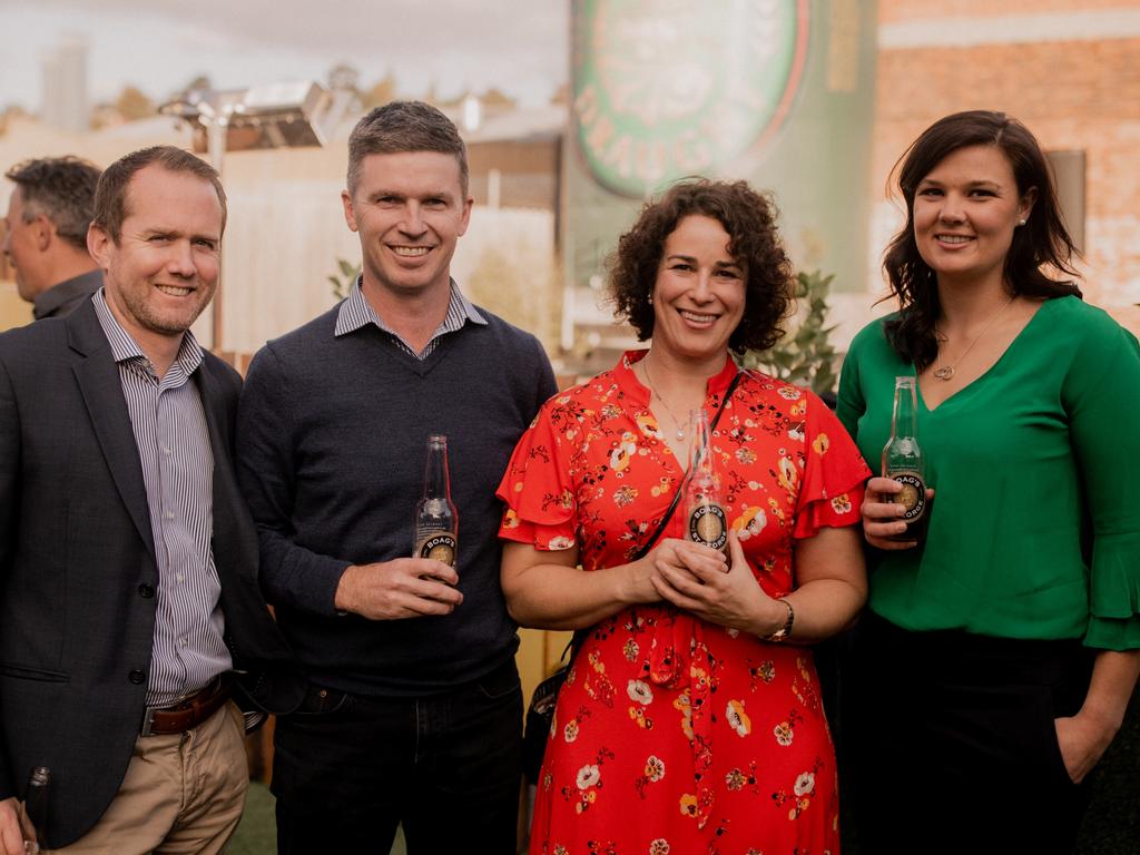 Jonathan Hess, of Hobart, left, and Scott Lister, Alex Warren and Erin Roles, all of Launceston, at the the relaunch of Boag’s St George beer. Picture: ROSIE HASTIE