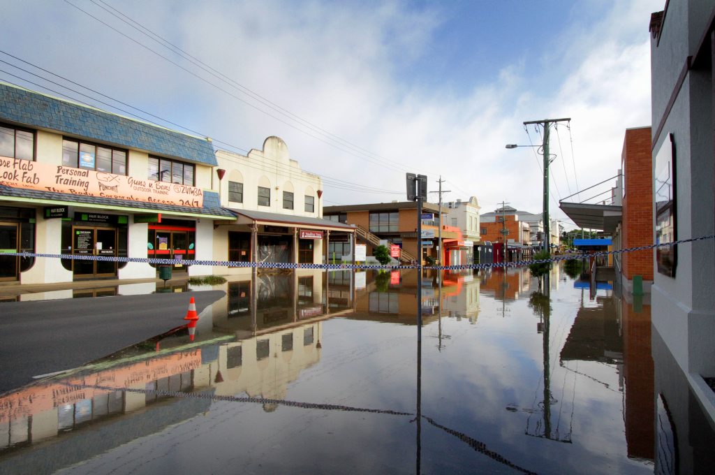 Water creeping up Bazaar St reaching the Chronicle office early Tuesday morning. Photo: Robyne Cuerel / Fraser Coast Chronicle. Picture: Robyne Cuerel