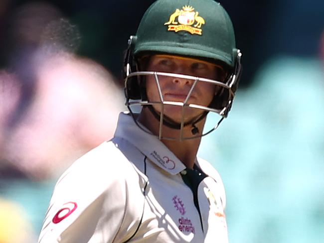 SYDNEY, AUSTRALIA - JANUARY 10: Steve Smith of Australia leaves the ground after being dismissed my Ravichandran Ashwin of India during day four of the Test match in the series between Australia and India at Sydney Cricket Ground on January 10, 2021 in Sydney, Australia. (Photo by Ryan Pierse/Getty Images)