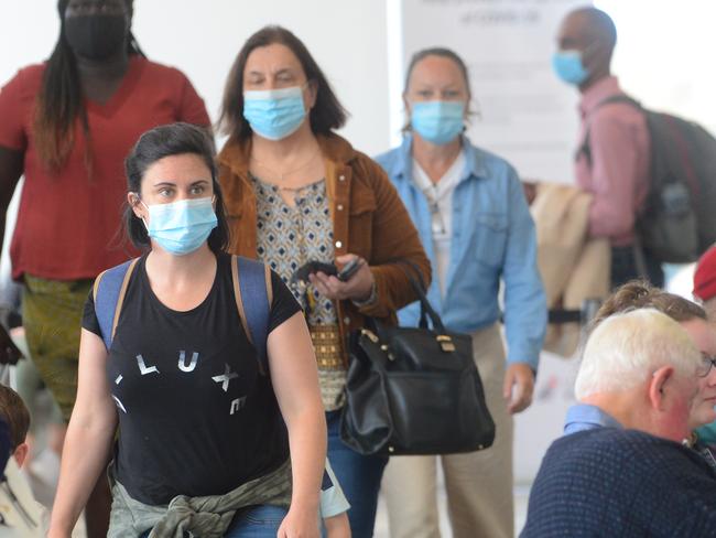 Adelaide Airport, Monday 21 December, 2020. Passengers on flight JQ762 from Sydney to Adelaide enter the Adelaide Airport Terminal and were ushered into an area for processing. Photo Sam Wundke. 10:55 am Gate 14