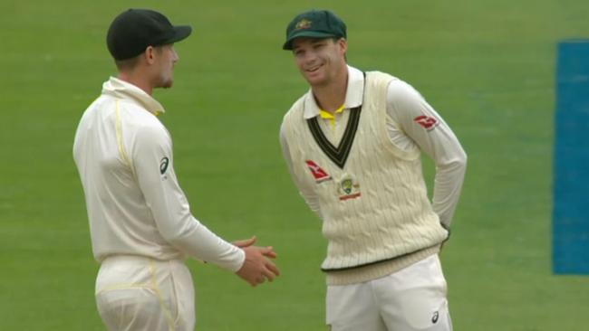 Peter Handscomb speaks to Cameron Bancroft to alert him he's been caught cheating.