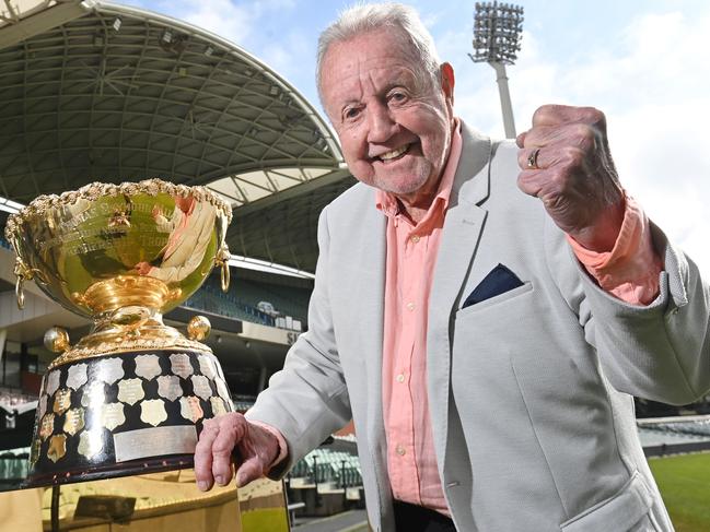 22/8/24. South Australian media legend Ken "KG'' Cunningham with the SANFL Premiership cup at Adelaide Oval.Picture: Keryn Stevens