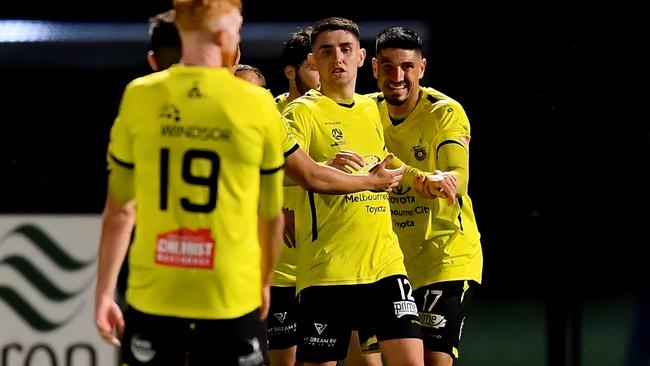 Heidelberg United players celebrate after Anthony Banovac of North Geelong scores an own goal during the round 10 NPL Victoria Men's match between Heidelberg United and North Geelong Warriors at Olympic Park in Heidelberg West, Victoria on April 21, 2023.