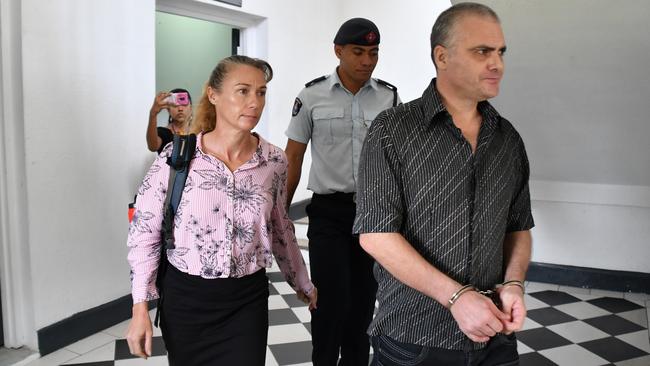 Yvette and John Nikolic at court in Suva, Fiji, before Yvette was allowed to walk free and John was jailed. Picture: News Corp Australia