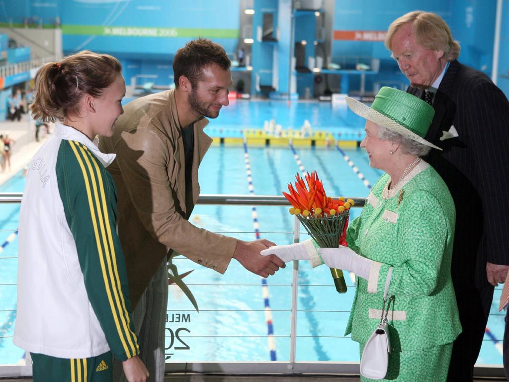 <b>2006 – Melbourne</b> In her 80th birthday year, the Queen returned to Australia to open the Commonwealth Games in Melbourne and is pictured here with Ian Thorpe and the youngest member of the Australian swim team, Kylie Palmer. The Queen had earlier stopped in Canberra where, at a dinner at Parliament House, she paid tribute to Australia, saying it had in her lifetime “established itself amongst the most respected nations of the world”.