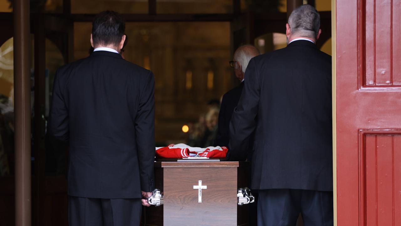 A St George Illawarra Dragons bomber jacket was laid across David Morrow’s casket. Picture: NewsWire / Damian Shaw