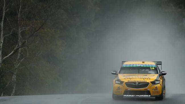 Tim Slade braves the wet Mount Panorama track. Picture: Getty Images