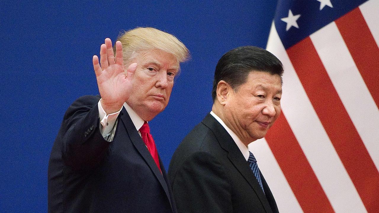 China is using its power to coerce nations (US President Donald Trump seen with China’s President Xi Jinping). Picture: Nicolas Asfouri/AFP