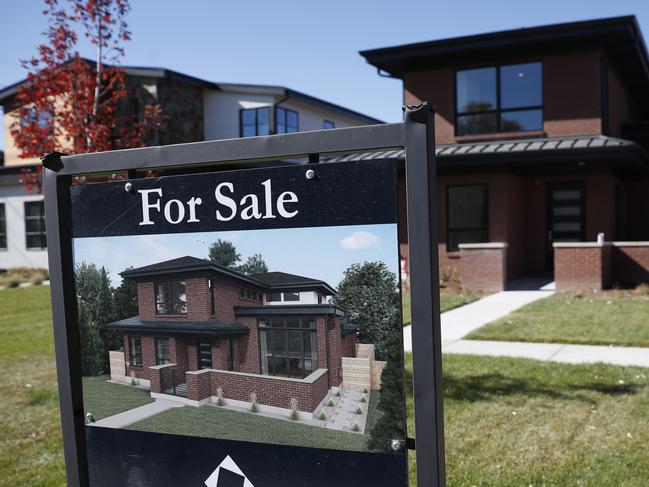 FILE - In this Oct. 22, 2019, photo a sign stands outside a new home for sale in southeast Denver.  U.S. long-term mortgage rates were stable to slightly lower this week after two weeks of declines amid deepening anxiety over the severe damage to the economy from the coronavirus pandemic. Home-loan rates have been hitting all-time lows, and mortgage buyer Freddie Mac says, Thursday, April 9, 2020,  thereâ€™s room for them to move lower.(AP Photo/David Zalubowski, File)