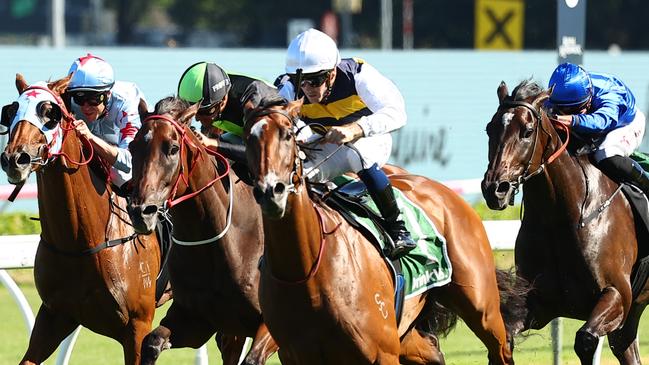 SYDNEY, AUSTRALIA - MARCH 09: Tyler Schiller riding Lady Laguna wins Race 7 James Squire Canterbury Stakes during "The Agency Randwick Guineas Day" -  Sydney Racing at Royal Randwick Racecourse on March 09, 2024 in Sydney, Australia. (Photo by Jeremy Ng/Getty Images)