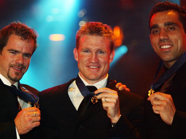 2003: Joint winners (l-r) Adelaide’s Mark Ricciuto with Collingwood’s Nathan Buckley and Sydney’s Adam Goodes with their Brownlow Medal. Picture: NewsCorp <a href="http://www.heraldsun.com.au/entertainment/brownlow-red-carpet" target="_blank">MORE BROWNLOW COVERAGE</a>