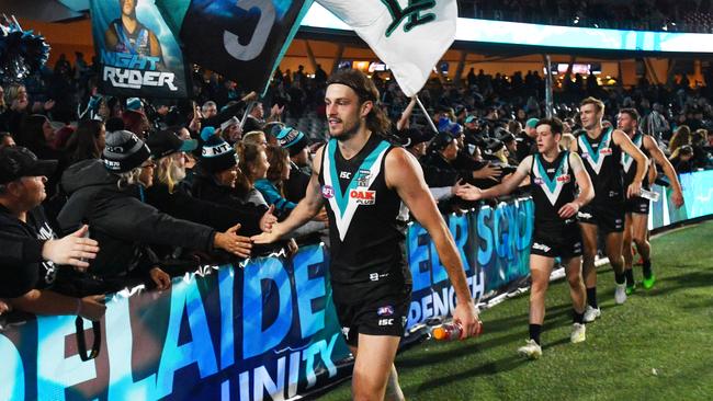 Power player Jarrod Lienert celebrates with the crowd. Picture: AAP Image/David Mariuz