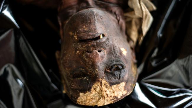 Health officials closed Henry's Funeral Home after recovering at least 120 unclaimed and rotting cadavers in Manila. The city health department conducted a surprise raid after receiving complaints about a foul odour coming from the funeral parlour. Picture: AFP / Noel Celis.