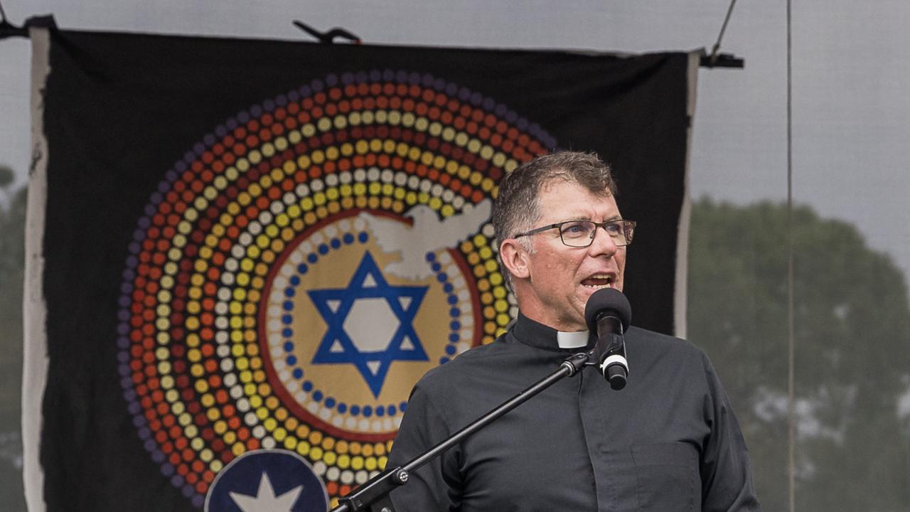 Anglican minister Reverend Mark Leach, one of the co-founders of the Never Again is Now movement, speaks at the Sydney rally. Photo: Contributed