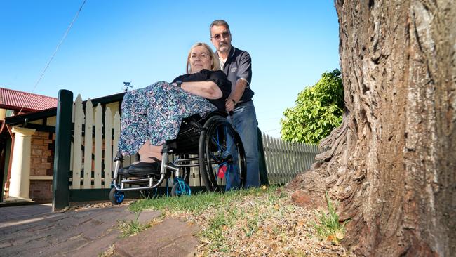 The tree roots are also causing the street pavers to lift up, meaning Ms Djukic cannot wheel her chair over the mound on her own. Picture: Dean Martin