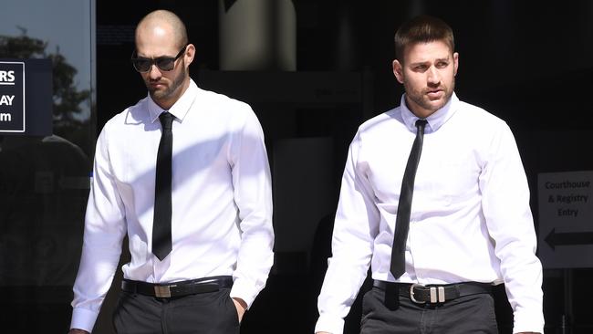 Josh Milani (left) and Sam Wallace leave the Southport courthouse. Picture: AAP Image/Dave Hunt