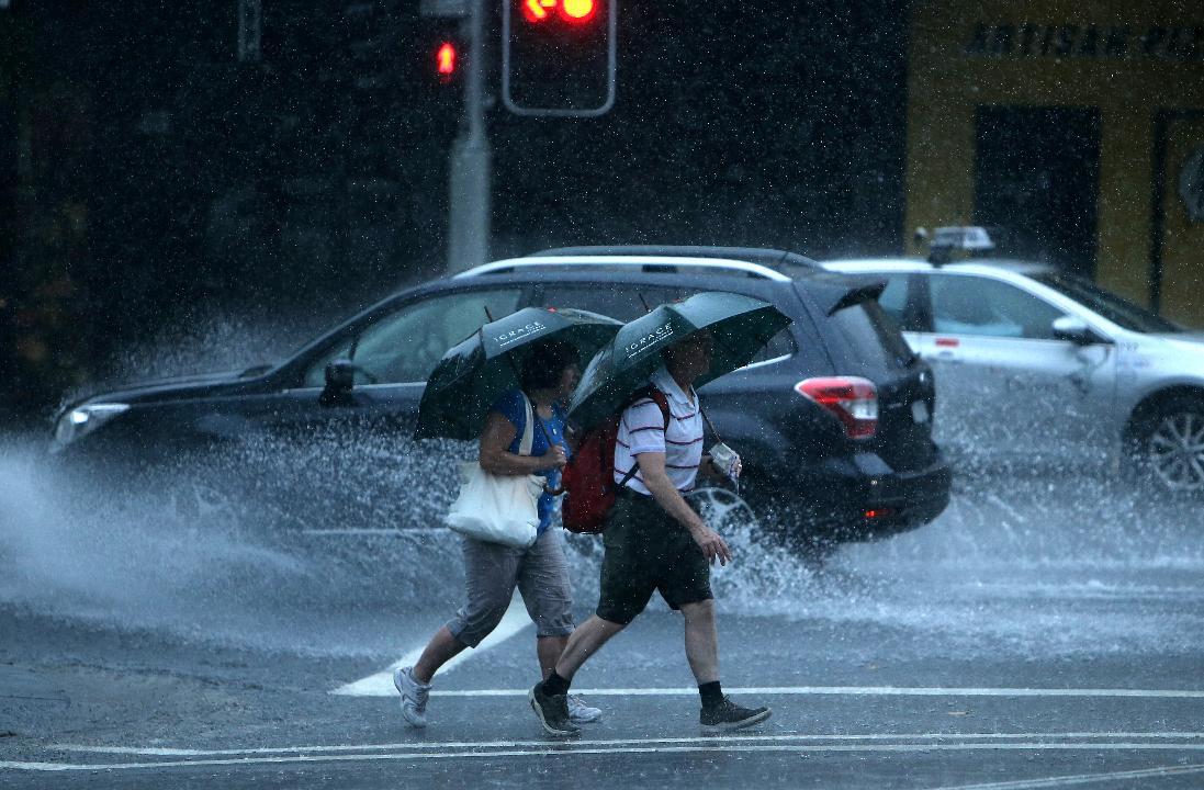 Sydney cops almost 50mm of rain in 30 minutes | Daily Telegraph