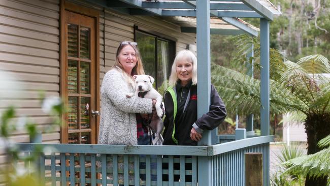 Strahan Holiday Retreat property manager Jeanette Hunt and senior sales assistant Jill Giles. Picture: PATRICK GEE