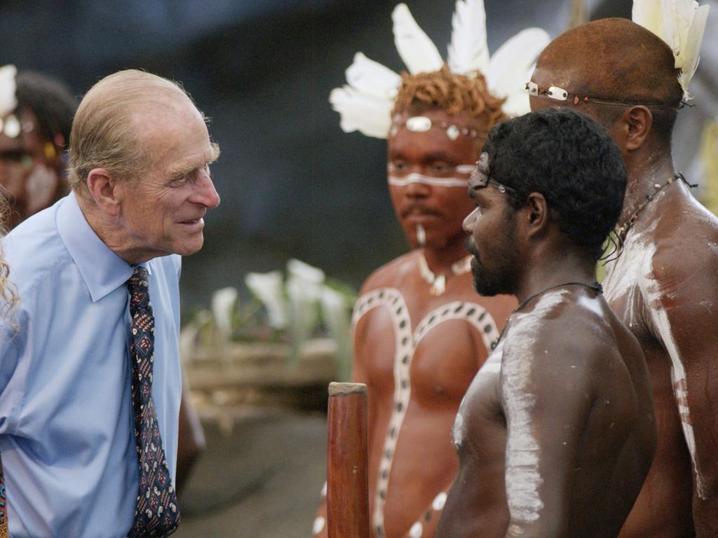 The Duke of Edinburgh talks to Indigenous performers in Cairns. Picture: Getty Images