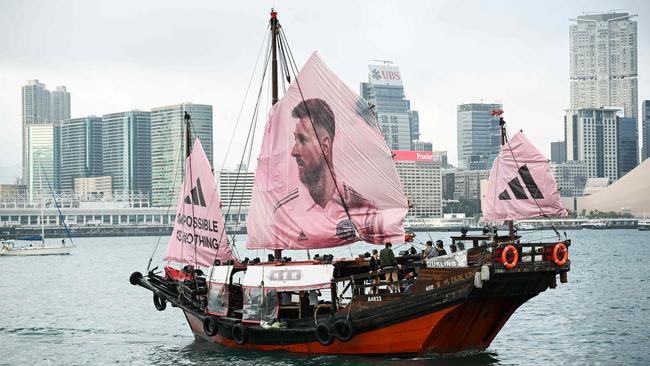 The face of Argentine forward Lionel Messi on a junk sailing across Hong Kong’s Victoria Harbour ahead of the match. Picture: AFP