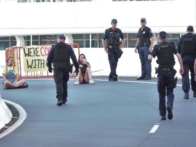 Two women have been arrested following a protest on the Turbot St on-ramp.