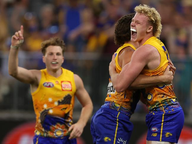 PERTH, AUSTRALIA – MAY 19: Reuben Ginbey of the Eagles celebrates a goal with teammates during the 2024 AFL Round 10 match between Waalitj Marawar (West Coast Eagles) and Narrm (Melbourne Demons) at Optus Stadium on May 19, 2024 in Perth, Australia. (Photo by Will Russell/AFL Photos via Getty Images)