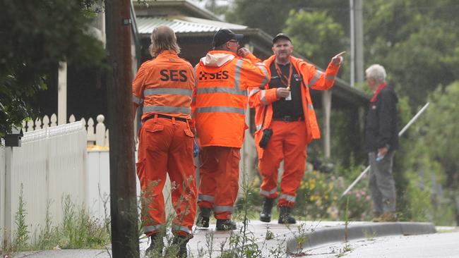 SES members door knock houses in Brooklyn in search of Leif. Picture John Grainger