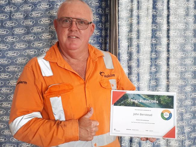 John “Benny” Benstead with an employee productivity award from Holcim Australia. Picture: Supplied