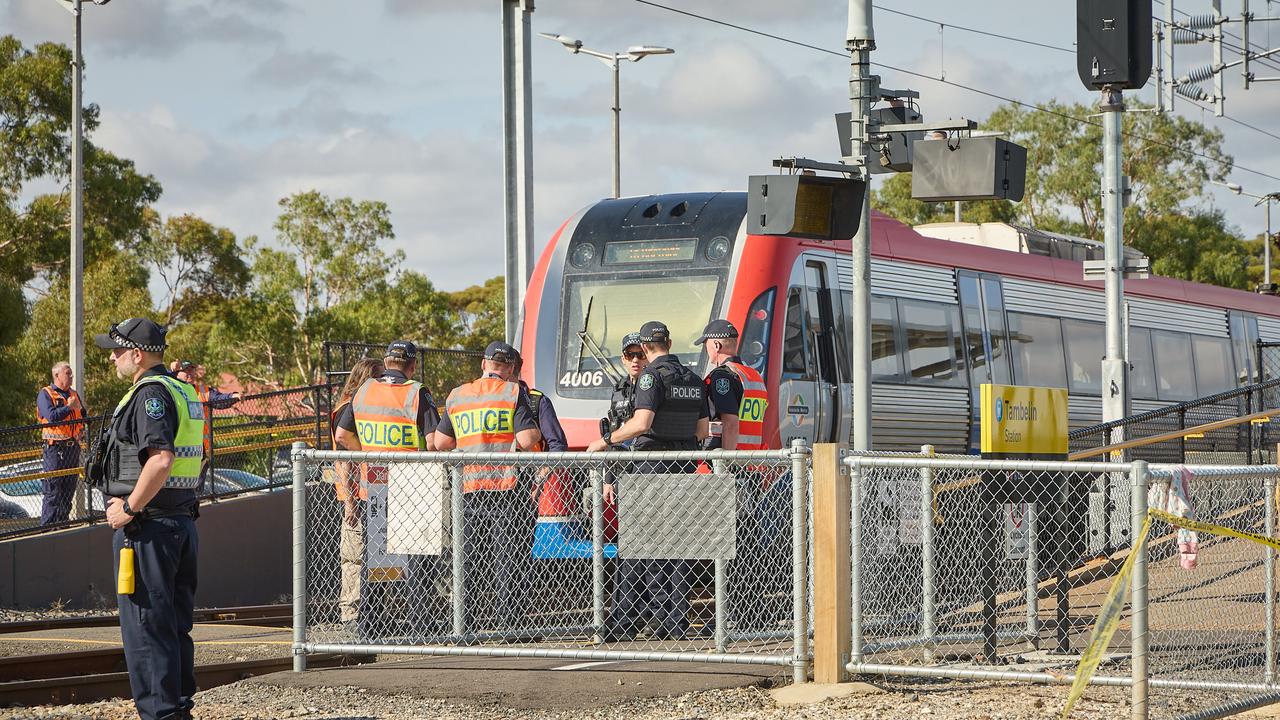 Police at Tambelin train station in Evanston Gardens, after the boy was hit on Tuesday. Picture: Matt Loxton