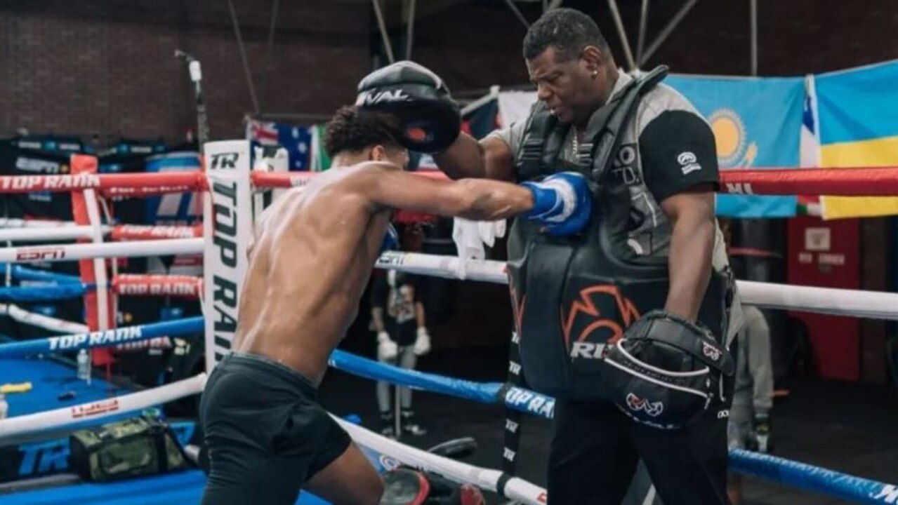 Rodney Crisler (right) training with undisputed lightweight champion Devin Haney. Picture: @rodneycrisler on Instagram